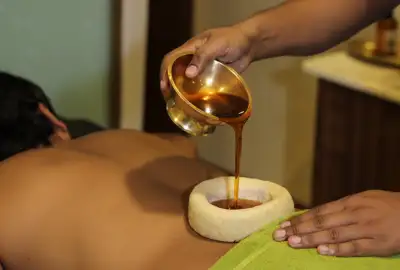 Kati Vasti lower back oil retention treatment at Keraliyaas Madhapur Hyderabad
